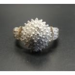 DIAMOND CLUSTER RING the multi diamonds in stepped circular setting, in all approximately 1ct, on