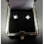 PAIR OF DIAMOND STUD EARRINGS the illusion set diamonds totalling approximately 0.1cts, in nine