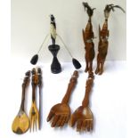 SELECTION OF AFRICAN CARVED HARDWOOD ORNAMENTS including an ebonised Kenyan rocking warrior desk