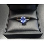 TANZANITE SOLITAIRE RING the oval cut tanzanite approximately 1ct, on eighteen carat gold shank,