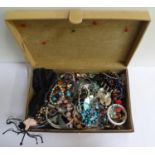 SELECTION OF COSTUME JEWELLERY including necklaces, pendants and rings; and a jewellery holder in