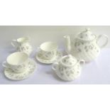 WEDGWOOD 'APRIL FLOWERS' DINNER SERVICE comprising dinner, entree and side plates, tea cups and