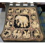 SAUDI ARABIAN EMBROIDERED WALL HANGING with a central decorative elephant surrounded by the twelve