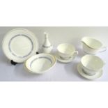 WEDGWOOD INSIGNIA PATTERN DINNER SERVICE comprising dinner and side plates, soup bowls and