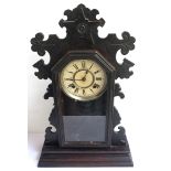 THE ANSONIA CLOCK COMPANY OF NEW YORK MAHOGANY MANTEL CLOCK contained in a shaped case with a glazed