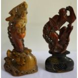 TWO CHINESE CARVED SOAPSTONE FIGURES the first of 'Zhongli Quan' one of the eight Immortals,