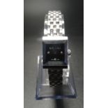 LADIES GUCCI WRISTWATCH the square black dial with diamond markers at 3, 6 and 9, on stainless steel