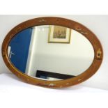 CHINOISERIE OVAL FRAMED WALL MIRROR with figure, motif and landscape decoration, 49cm high x 77cm