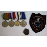 BRITISH BAR MOUNTED MEDAL GROUP comprising 1939-45 Defence and War Medals; Jubilee Medal 1977 and an