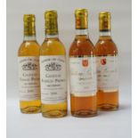 FOUR BOTTLES OF VINTAGE SAUTERNES Examples of Vintage Sauternes from two classic producers. Two