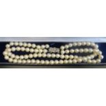 DOUBLE STRAND PEARL NECKLACE with diamond set nine carat white gold clasp, approximately 37cm long