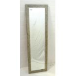 SILVERED WOOD STEPPED WALL MIRROR with a rectangular bevelled plate, 131cm x 39.5cm