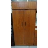 SAKOL TEAK WARDROBE the lift up cupboard door above a pair of doors with roll over handles, standing