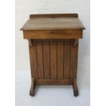 OAK CLERKS DESK the raised back above a pen trough with a central brass inkwell marked 'The Bennet