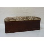 VINTAGE PINE OTTOMAN with lift-up padded lid, carrying handles, raised on plinth base, 38cm high x