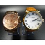 TWO FASHION WATCHES comprising a Links of London Driver watch, the large white dial with roman