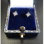 PAIR OF ILLUSION SET DIAMOND STUD EARRINGS the diamonds totalling approximately 0.1cts, in nine