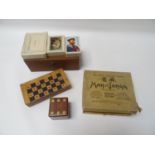 SELECTION OF GAMES including a boxed set of Mah-Jongg with instructions; a travelling chess set with