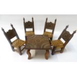 CARVED SET OF DOLLS FURNITURE comprising a dining table with a central floral motif and geometric