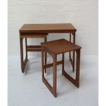 MCINTOSH & CO TEAK OCCASIONAL TABLE with an oblong fold over rotating top, standing on shaped
