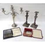 SELECTION OF SILVER PLATE including a pair of neoclassical style candlesticks, 31cm high, cased