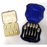 SET OF EDWARD VII SILVER TEA SPOONS and a pair of sugar nips, cased, by John Deakin & Sons,