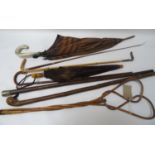 SELECTION OF WALKING STICKS, PARASOLS AND RIDING CROPS including a silver plate mounted cane, a