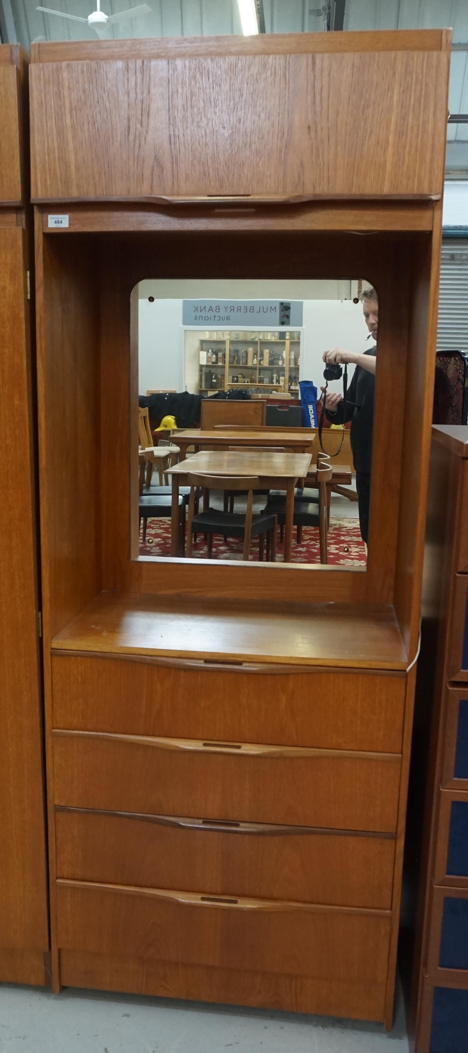 SAKOL TEAK DRESSING CUPBOARD the lift up cupboard door above a mirror backed recess with four