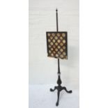 VICTORIAN POLE SCREEN raised on a tripod base, the column with urn finial, the adjustable