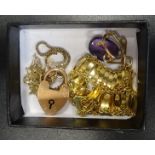 SELECTION OF NINE CARAT GOLD JEWELLERY comprising a bracelet, a neck chain, a heart padlock clasp,