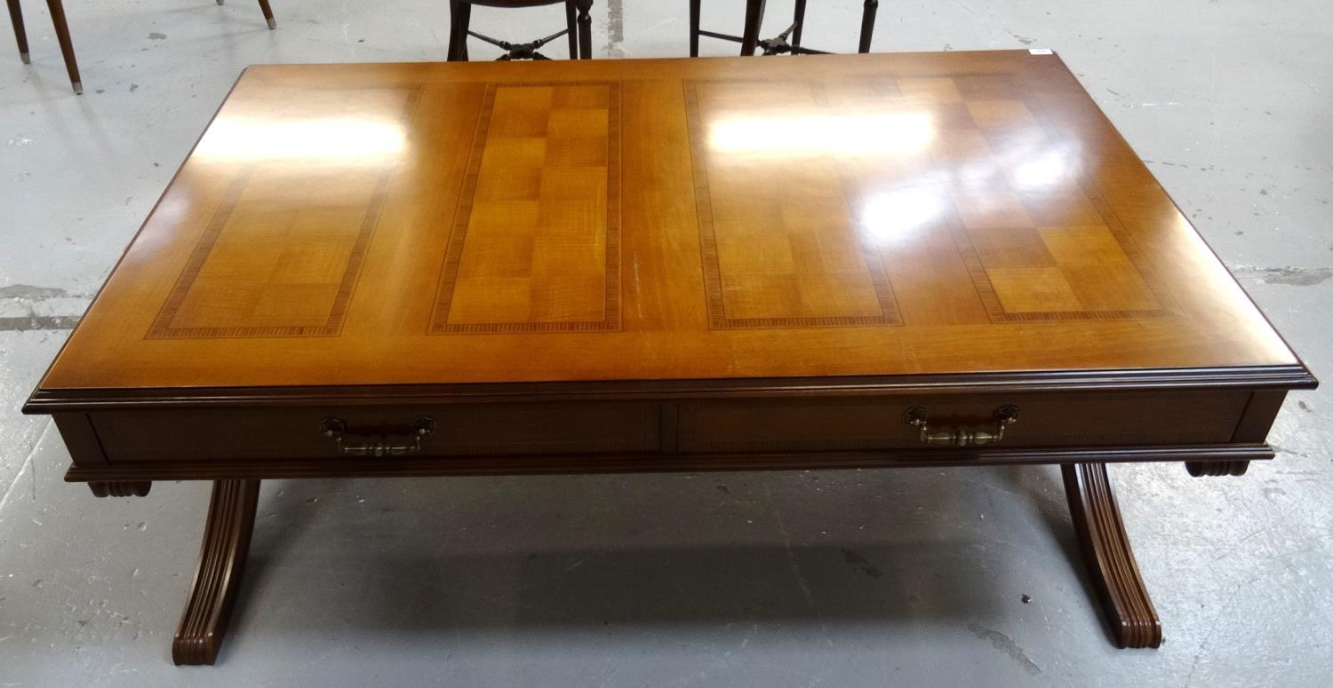 HURTADO OF SPAIN MAHOGANY OCCASIONAL TABLE with an oblong moulded top set with four oblong checker