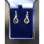 PAIR OF SAPPHIRE AND DIAMOND DROP EARRINGS of entwined design, in nine carat gold