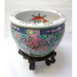 20th CENTURY CHINESE NYONYA STRAITS PORCELAIN FISH BOWL the rim decorated with roses above an