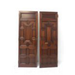 PAIR OF MAHOGANY DOORS circa 1900, each with geometric panels and brass handles and hinges, 182.