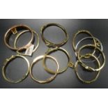 NINE MICHAEL KORS BANGLES comprising three enamel and pave crystal set padlock bangles (turquoise,