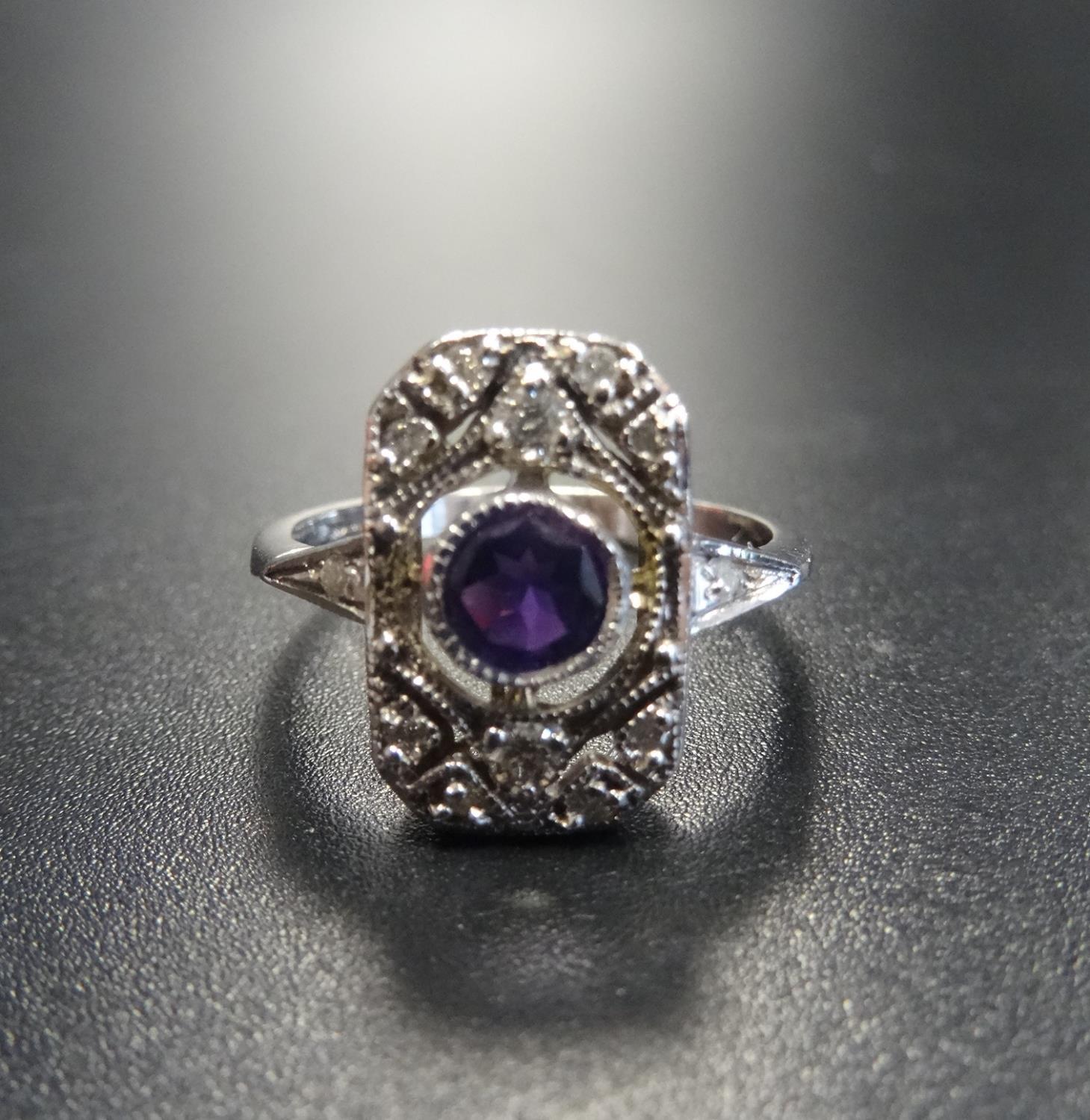 ART DECO STYLE AMETHYST AND DIAMOND PLAQUE RING the central round cut amethyst in diamond set