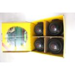 SET OF FOUR THOMAS TAYLOR LAWN BOWLS size 5 and marked 'A. McD', boxed