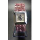LADIES SWAROVSKI CRYSTAL WRISTWATCH with pink crystal set strap