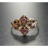 GARNET CLUSTER RING the eight cabochon garnets in nine carat gold setting, ring size N
