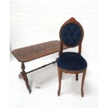 TEAK SIDE CHAIR the shaped button back with carved decoration above a stuff over seat, both in
