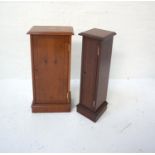 YEW CD STORAGE TOWER with moulded top and panel door, standing on a plinth base, 75cm high; along