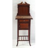 FRENCH PINE WASH STAND with a shaped raised back with a moulded shelf above a panelled back with a