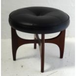 LEATHER G PLAN "ASTRO" STOOL of circular shape with single central button in upholstery, standing on