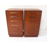 PAIR OF TEAK G PLAN CHESTS OF DRAWERS comprising of six drawers with moulded handles and standing on