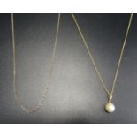 PEARL DROP PEANDANT in unmarked gold mount and on nine carat gold chain; together with another