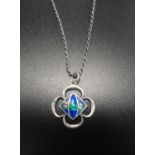 ENAMEL DECORATED SILVER PENDANT of quatrefoil design, on silver chain