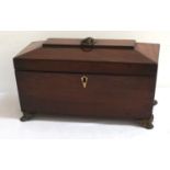 GEORGE III MAHOGANY SARCOPHAGUS TEA CADDY the lid with a lion mask and ring handle, the interior