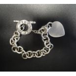 TIFFANY & CO. SILVER HEART TAG AND TOGGLE BRACELET the circular clasp section marked 'Tiffany &