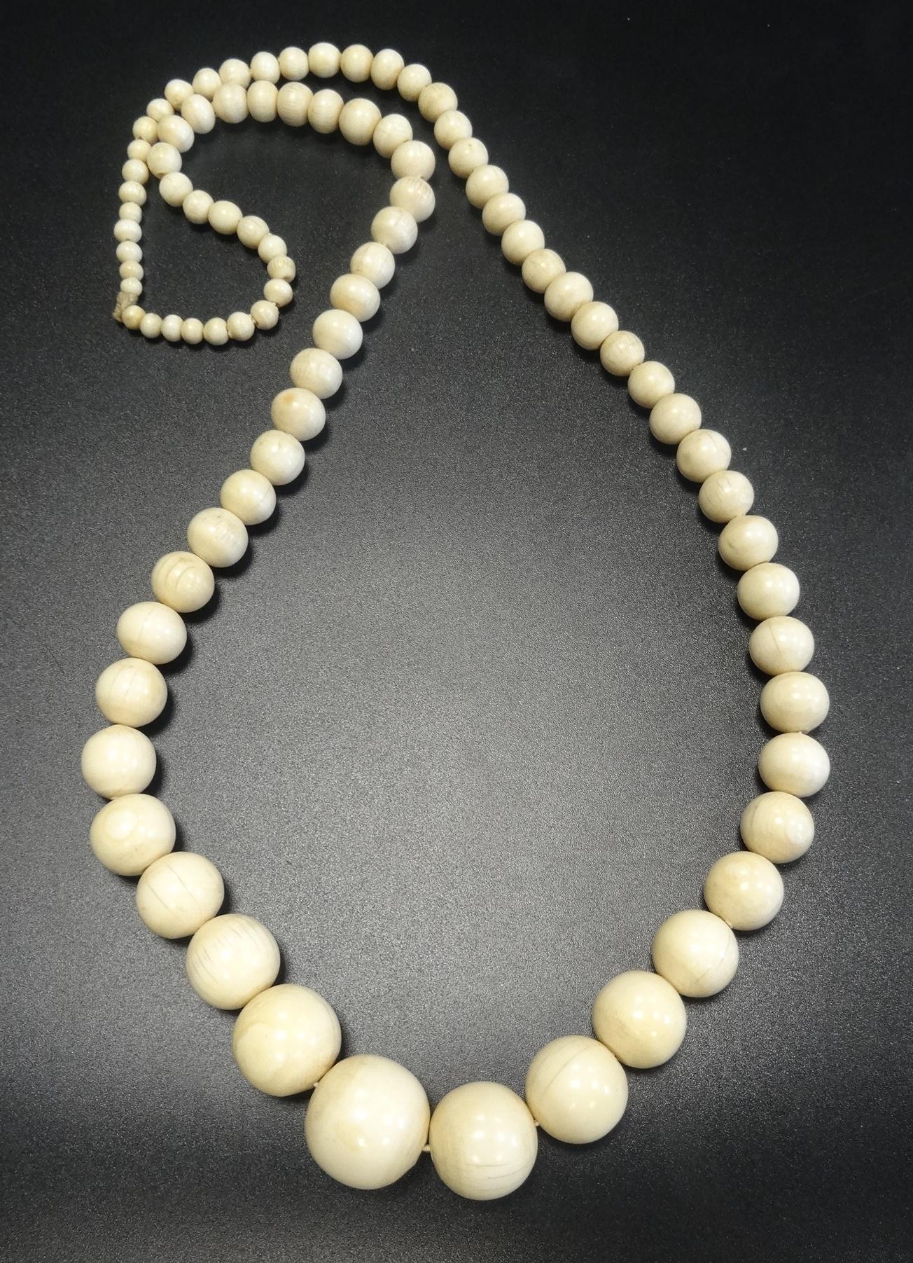 GRADUATED IVORY BEAD NECKLACE approximately 82cm long