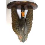 LARGE CARVED WOOD WALL BRACKET with a semi elliptical top supported by a decorative black swan, with